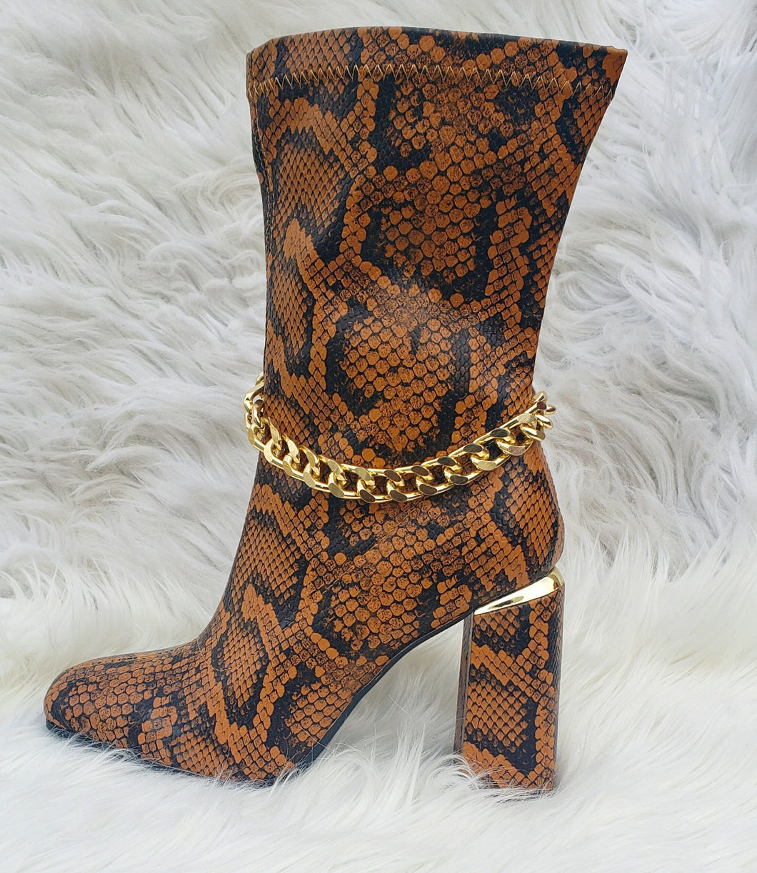 Tamed Snakeskin Boots